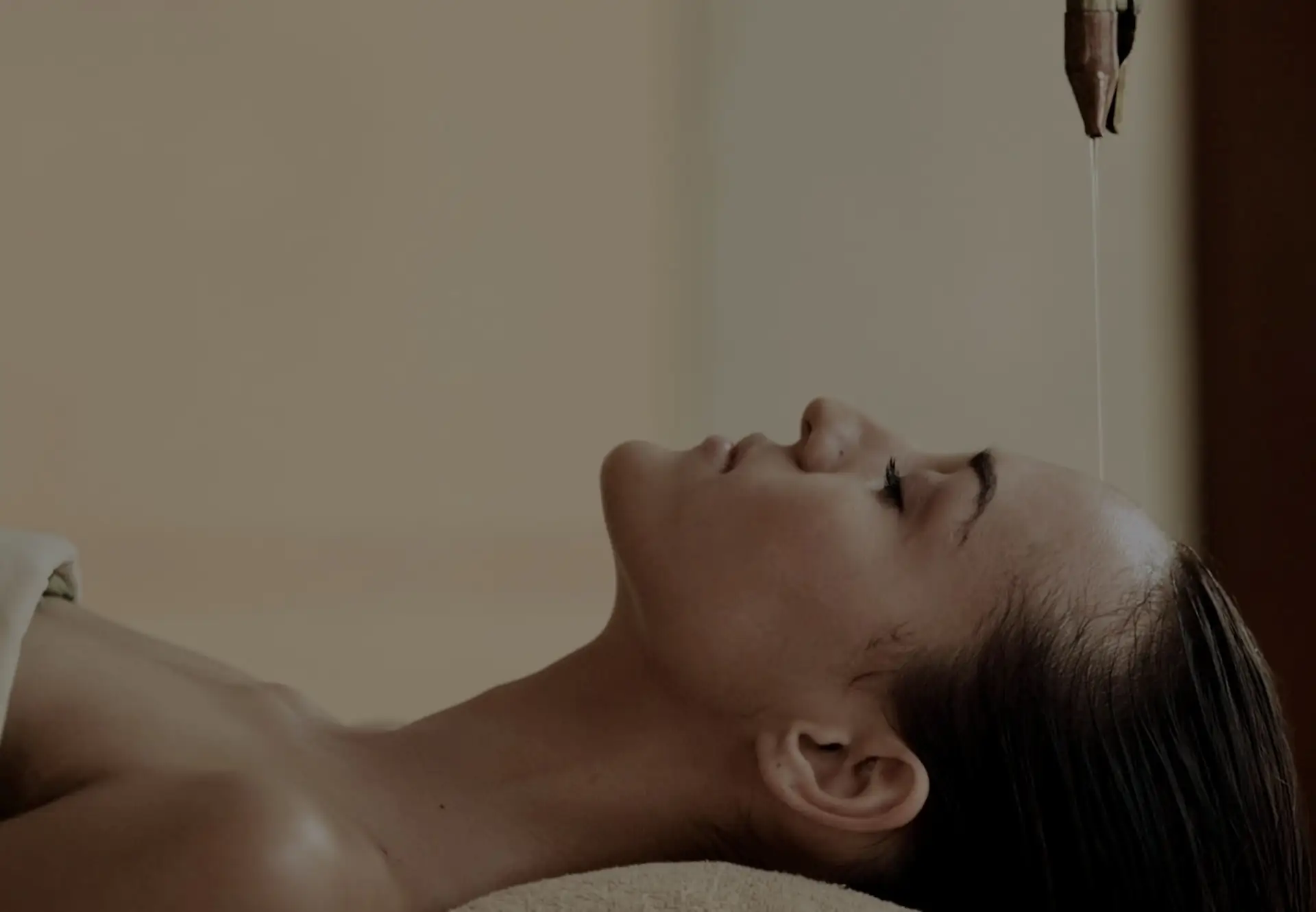 Guest relaxing during an Ayurvedic treatment at Ayur Spa Bali